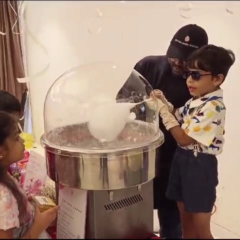 Kids making cotton candy